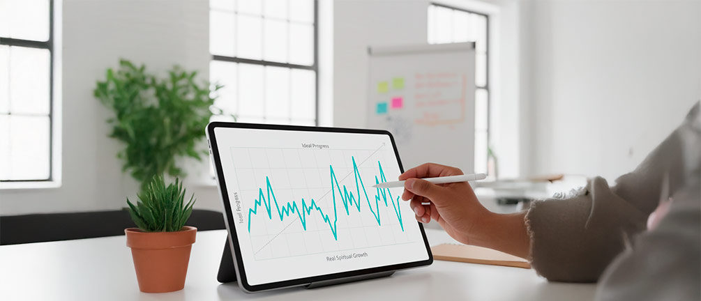 A digital or hand-drawn graph on a whiteboard or tablet screen, showing a line representing 'progress.' Instead of a straight 45-degree angle, the line is clearly jagged, moving up and down but with an overall upward trend. A young hand (diverse) is drawing or pointing to this line. The background is a brightly lit, modern classroom or study space, suggesting learning and self-reflection.